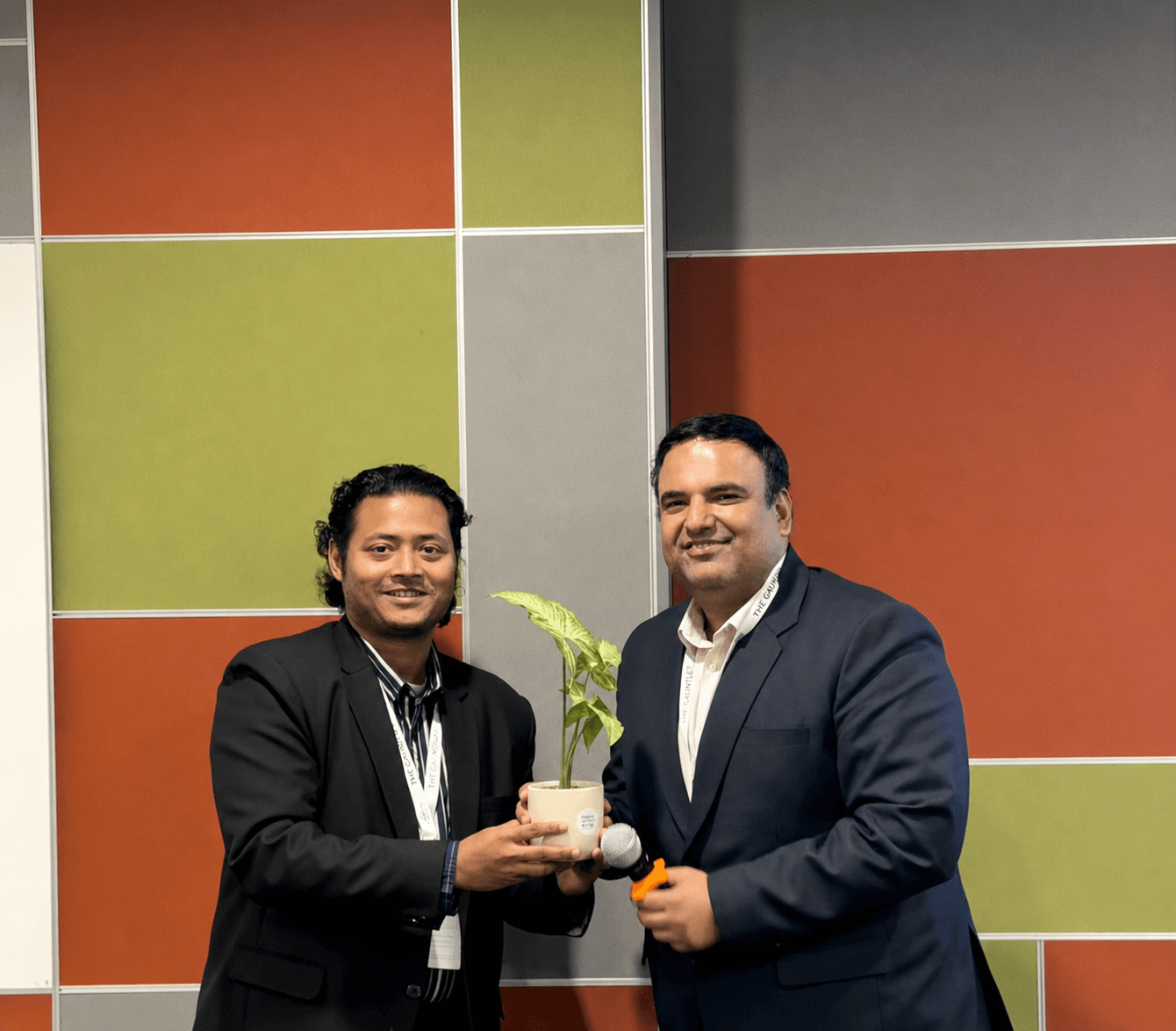 Swapnil Sahoo presenting a plant during an event at Great Lakes