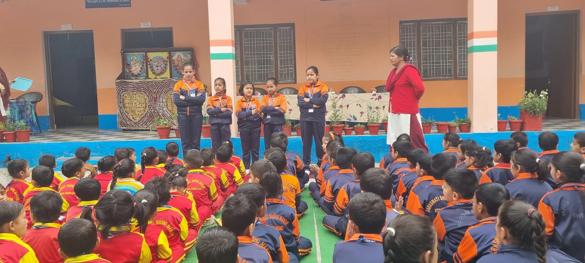 Students and teachers gathered for morning assembly at Saraswati Shishu Mandir in Dhaknoli